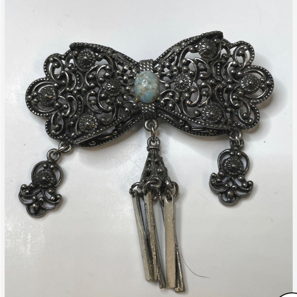 Ornate vintage Weiss Silver tone Brooch with Blue Stone